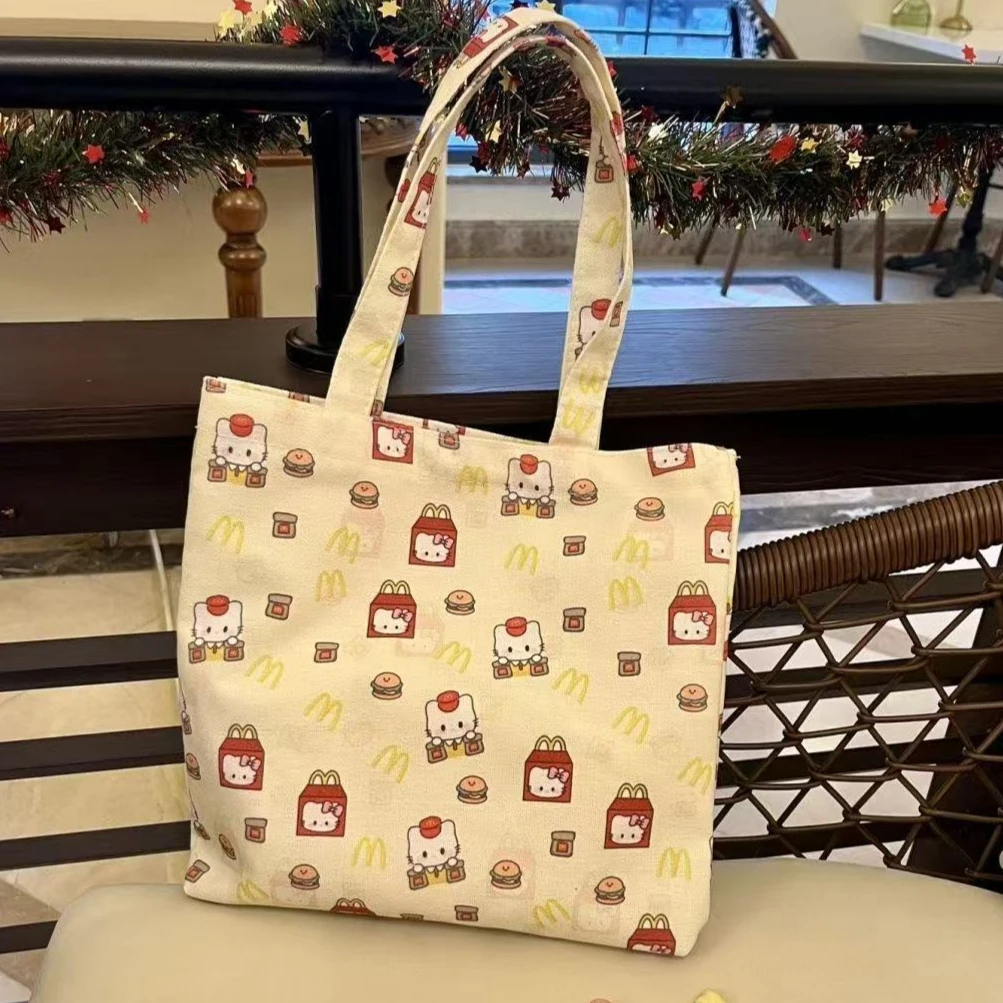 Miniso Hello Kitty Canvas Bag High-capacity Versatile Commute Single Shoulder Bento Bag New Fashion Leisure Trend Tote Handbag
Miniso Hello Kitty Canvas Bag High-capacity Versatile Commute Single Shoulder Bento Bag New Fashion Leisure Trend Tote Handbag