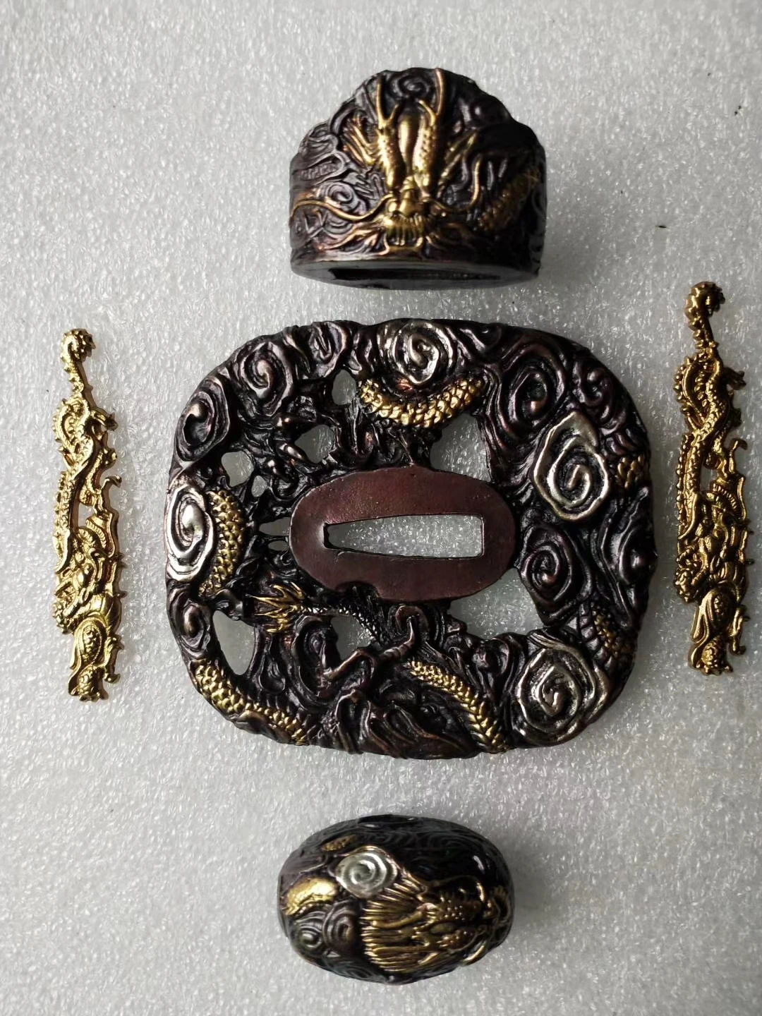 A Set Quality Sword's Accessories Tsuba Kashira Fuchi Menuki Cloud Dragon Case For Blade JP. Katana Copper Fitting
A Set Quality Sword's Accessories Tsuba Kashira Fuchi Menuki Cloud Dragon Case For Blade JP. Katana Copper Fitting