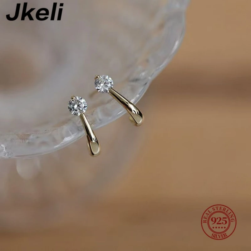 Jkeli S925 Sterling Silver 14K Gold Plated Mini Universe Single Diamond Elegant Stud Earrings Women Simple Versatile Ear Jewelry
Jkeli S925 Sterling Silver 14K Gold Plated Mini Universe Single Diamond Elegant Stud Earrings Women Simple Versatile Ear Jewelry