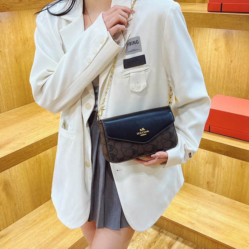 Classic printed shoulder bag, fashionable and high-end retro hand-held diagonal cross women's bag
Classic printed shoulder bag, fashionable and high-end retro hand-held diagonal cross women's bag