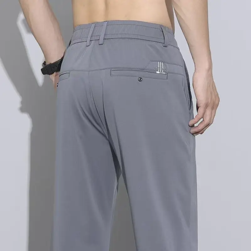 Мужские летние повседневные брюки из ледяного шелка, 2025 г., прямые, свободные, эластичные, быстросохнущие, дышащие, спортивные, молодежные, тонкие, стильные, размер 28-38
Мужские летние повседневные брюки из ледяного шелка, 2025 г., прямые, свободные, эластичные, быстросохнущие, дышащие, спортивные, молодежные, тонкие, стильные, размер 28-38