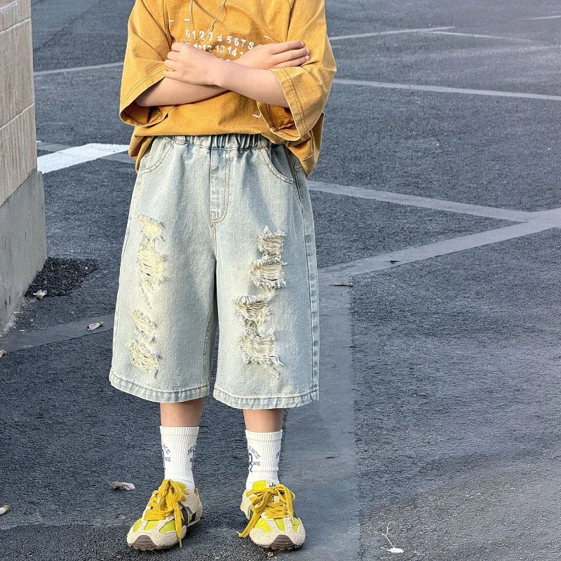 2026 Summer Hot Selling Thin Washed Light Colored Denim Ripped Cropped Pants for Children
2026 Summer Hot Selling Thin Washed Light Colored Denim Ripped Cropped Pants for Children
