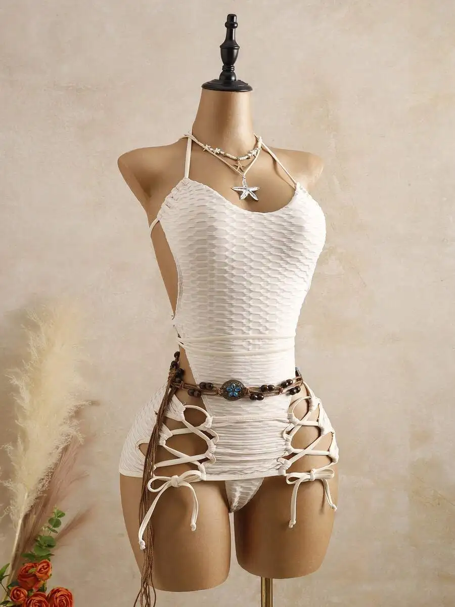 Cream Textured One-Piece Swimsuit With Lace-Up Skirt And Boho Belt
Cream Textured One-Piece Swimsuit With Lace-Up Skirt And Boho Belt