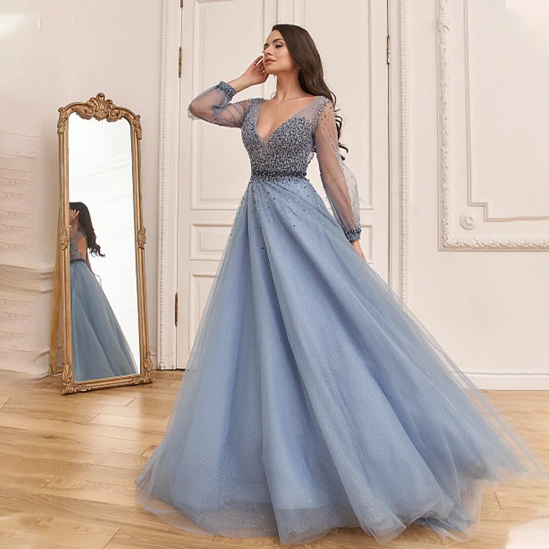 Stunning Blue Beaded Long Sleeves V-neck A Line Prom Dresses Backless Party Formal Evening Gowns with Tassel
Stunning Blue Beaded Long Sleeves V-neck A Line Prom Dresses Backless Party Formal Evening Gowns with Tassel
