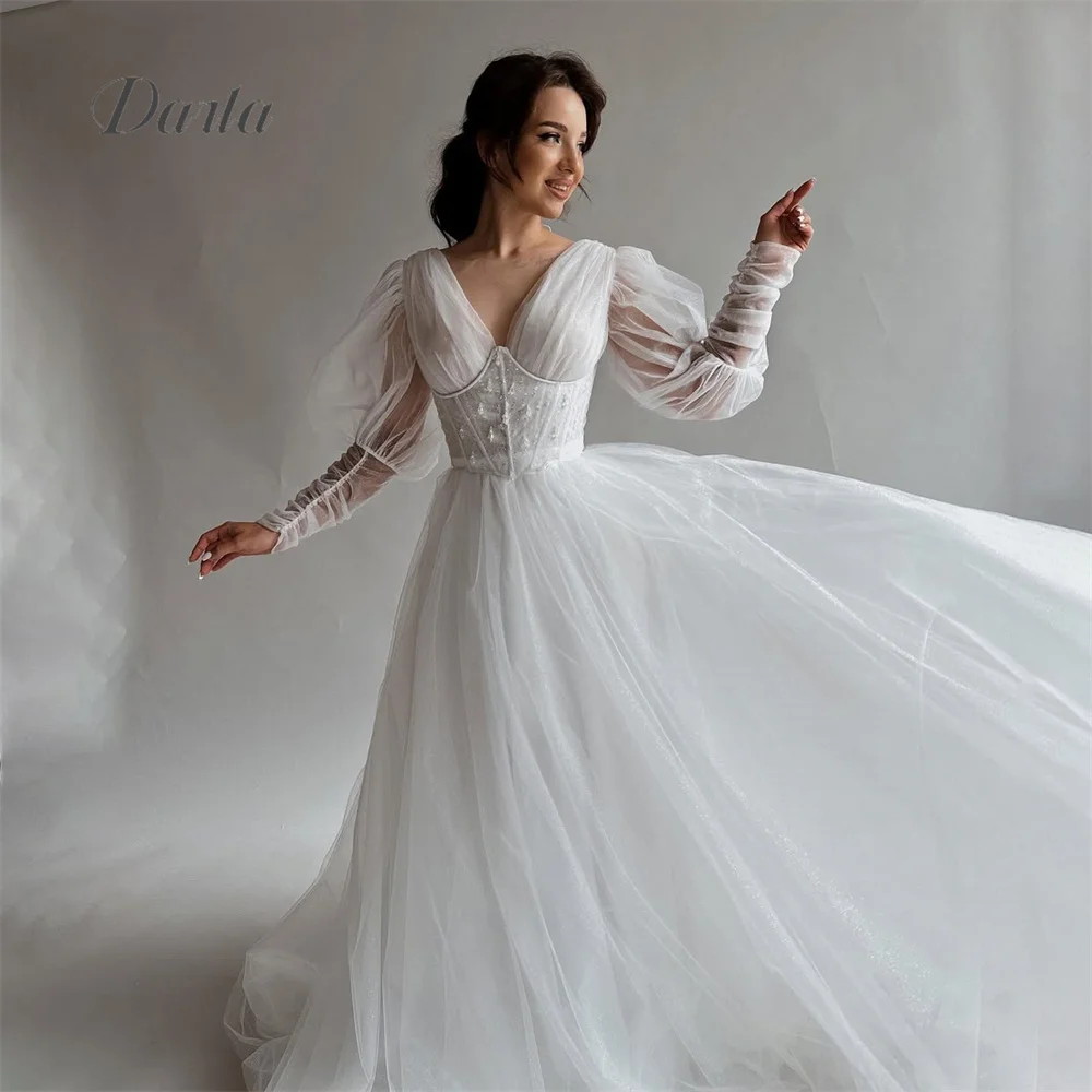 Darla Customized Deep V-Neck Long Sleeve Ruffles Ruched Corset A-Line Wedding Dress Ball Gown Elegant Sweep Train Floor Length
Darla Customized Deep V-Neck Long Sleeve Ruffles Ruched Corset A-Line Wedding Dress Ball Gown Elegant Sweep Train Floor Length
