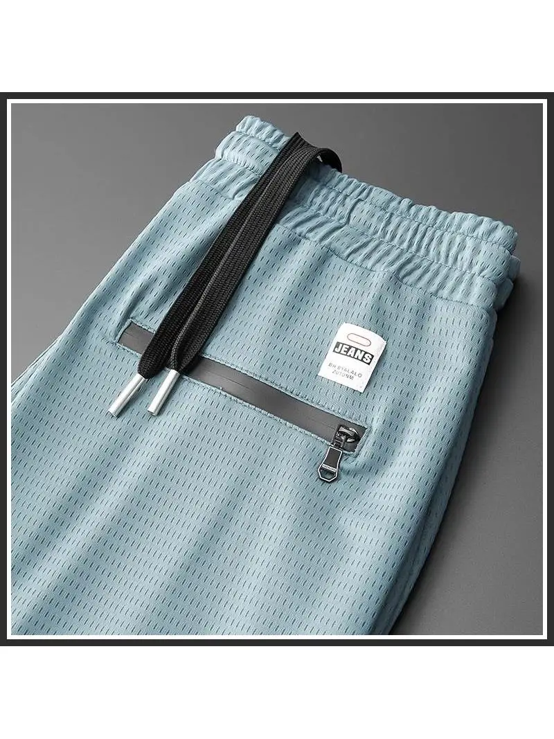 Ультратонкие летние спортивные брюки из ледяного шелка для мужчин: быстросохнущие, дышащие, свободные, повседневные, укороченные (до щиколотки), из нейлона и спандекса.
Ультратонкие летние спортивные брюки из ледяного шелка для мужчин: быстросохнущие, дышащие, свободные, повседневные, укороченные (до щиколотки), из нейлона и спандекса.