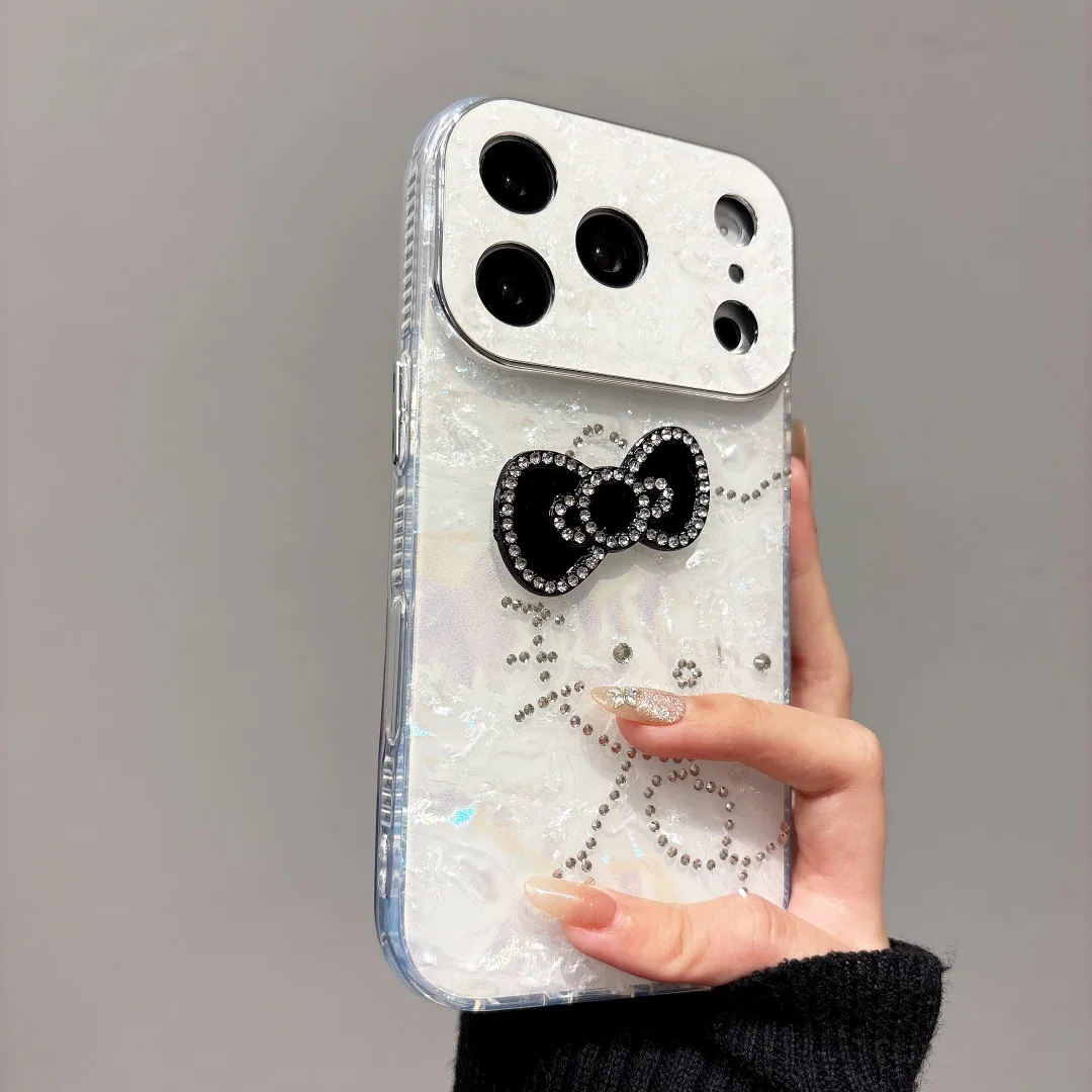 Luxury Laser Shell Glitter Diamond Bow KT Phone Case For iphone 17 16 15 14 Pro Max 13 Cartoon Shockproof Protective Back Cover
Luxury Laser Shell Glitter Diamond Bow KT Phone Case For iphone 17 16 15 14 Pro Max 13 Cartoon Shockproof Protective Back Cover