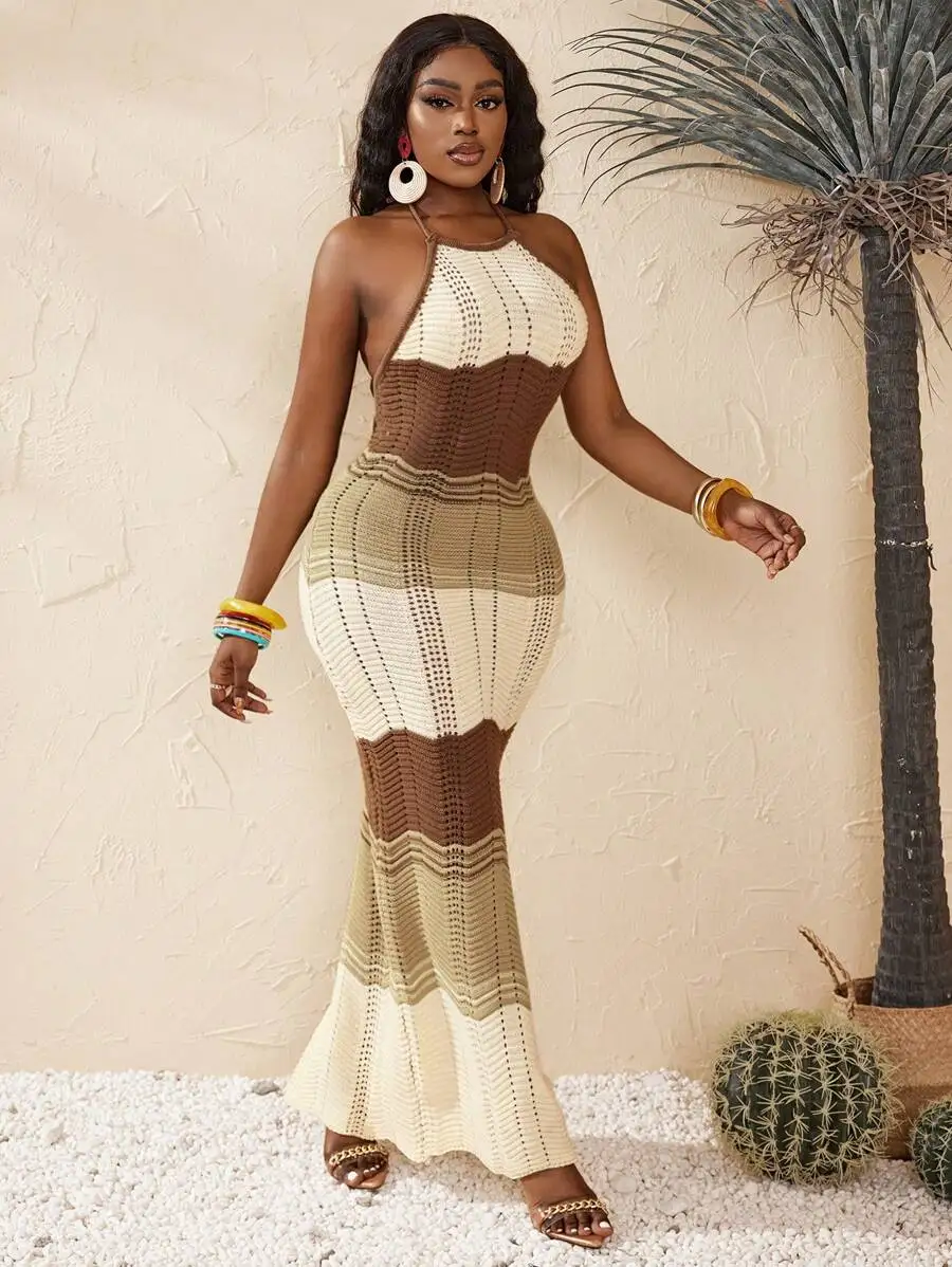 Knitted Halter Neck Maxi Dress With Color Block And Cutout Detail
Knitted Halter Neck Maxi Dress With Color Block And Cutout Detail