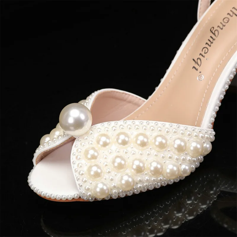 Designer Women's Sandals 2026 New Banquet High Heels Luxury Thick Heel Shallow Mouth Women's Pearl Sandals Wedding Shoes Zapatos
Designer Women's Sandals 2026 New Banquet High Heels Luxury Thick Heel Shallow Mouth Women's Pearl Sandals Wedding Shoes Zapatos