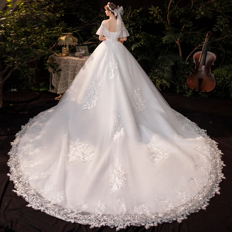 Y & M Novias Новые роскошные длинные кружевные свадебные платья с аппликацией и коротким рукавом со шлейфом, платье принцессы с вышивкой для невесты, индивидуальное платье больших размеров
Y & M Novias Новые роскошные длинные кружевные свадебные платья с аппликацией и коротким рукавом со шлейфом, платье принцессы с вышивкой для невесты, индивидуальное платье больших размеров