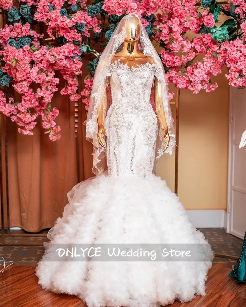 Elegant Mermaid Wedding Dresses 2025 With Veil Luxury Bead Diamonds Crystals African Bridal Gowns Tiered Ruffles Customized
Elegant Mermaid Wedding Dresses 2025 With Veil Luxury Bead Diamonds Crystals African Bridal Gowns Tiered Ruffles Customized
