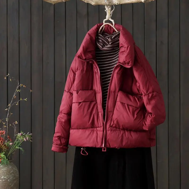 Теплая белая пуховая куртка с воротником-стойкой и большими карманами для женщин, для повседневной носки, с наполнителем из полиэфирного волокна
Теплая белая пуховая куртка с воротником-стойкой и большими карманами для женщин, для повседневной носки, с наполнителем из полиэфирного волокна