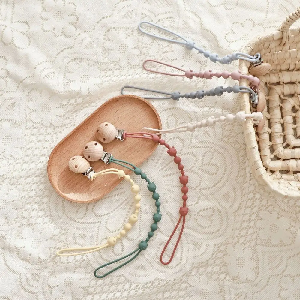 Food Grade Silicone Baby Pacifier Clips Lightweight Integrated Soother Clip Chain Anti-drop Durable Teether Teething Toy
Food Grade Silicone Baby Pacifier Clips Lightweight Integrated Soother Clip Chain Anti-drop Durable Teether Teething Toy