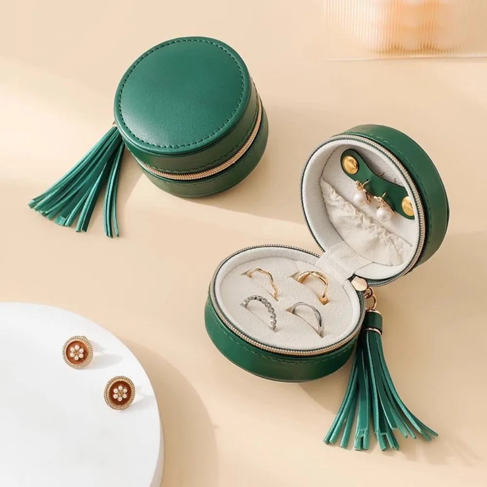 PU Leather Jewelry Storage Box Round Shape with Tassel Rings Earrings Organizer Dust-proof Waterproof Necklace Display Case
PU Leather Jewelry Storage Box Round Shape with Tassel Rings Earrings Organizer Dust-proof Waterproof Necklace Display Case