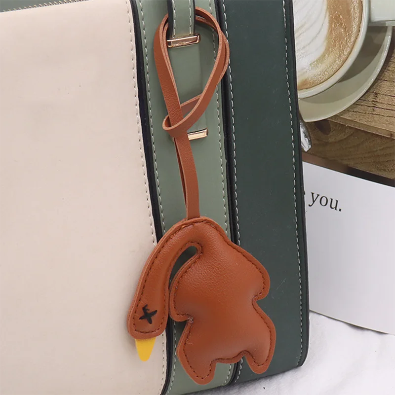 Pu Leather Bag Charm Creative Roast Goose Bag Pendant Leather Car Keychain Pendant DIY Material Bag Birthday Gift
Pu Leather Bag Charm Creative Roast Goose Bag Pendant Leather Car Keychain Pendant DIY Material Bag Birthday Gift