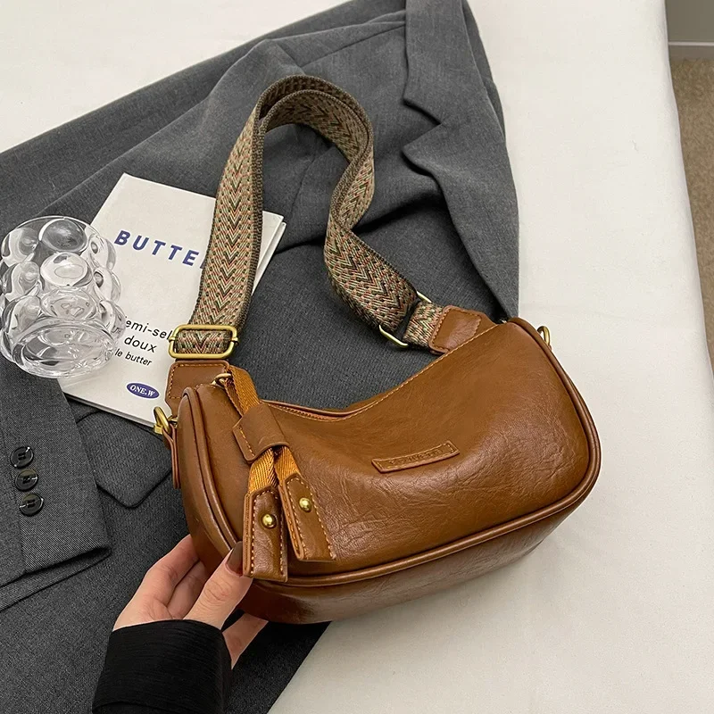 Retro PU Shoulder Bag Women's Wide Shoulder Strap Design Popular Messenger Bag Fashion Casual Adjustable Mobile Phone Bags
Retro PU Shoulder Bag Women's Wide Shoulder Strap Design Popular Messenger Bag Fashion Casual Adjustable Mobile Phone Bags