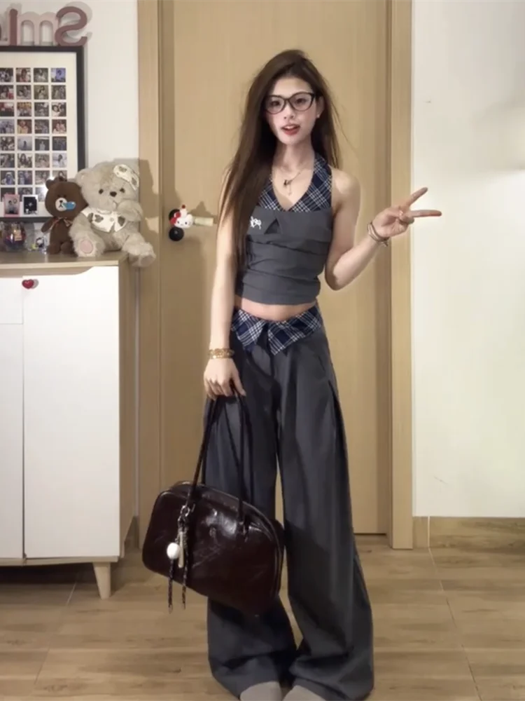 American style spicy girl patchwork plaid hanging neck tank top high waist and wide leg pants women's summer two-piece set
American style spicy girl patchwork plaid hanging neck tank top high waist and wide leg pants women's summer two-piece set