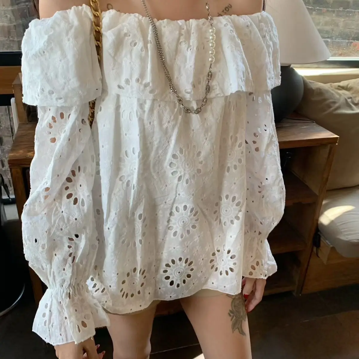Commuter Style One-word Collar Hollow Embroidered Shirt Women's Spring New Ruffle Edge Loose Wear Top
Commuter Style One-word Collar Hollow Embroidered Shirt Women's Spring New Ruffle Edge Loose Wear Top
