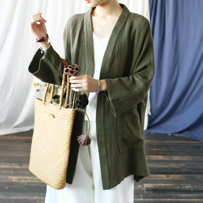 Literary and retro loose ethnic style women's clothing medium and long autumn V-neck top
Literary and retro loose ethnic style women's clothing medium and long autumn V-neck top