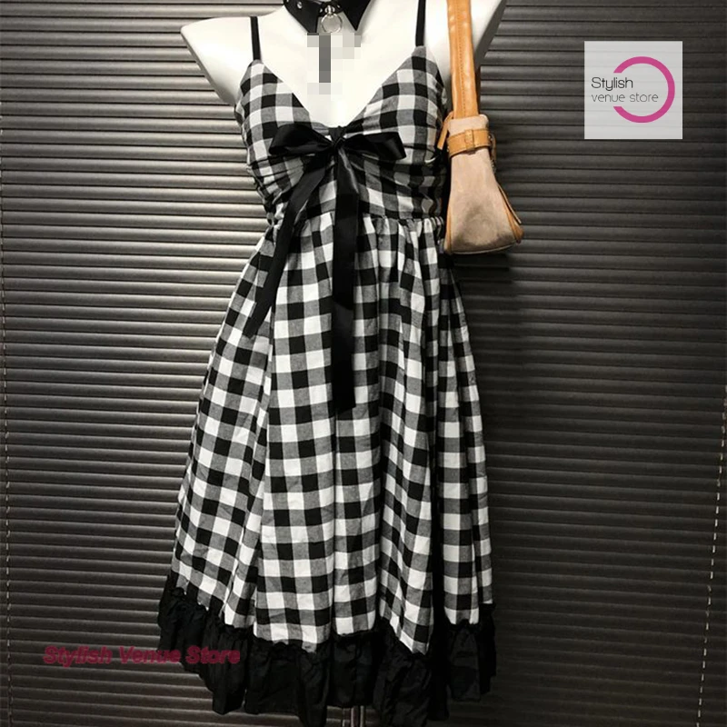 Summer new black and white waist plaid stitching sling bow dress female American fashion temperament waist casual dress
Summer new black and white waist plaid stitching sling bow dress female American fashion temperament waist casual dress