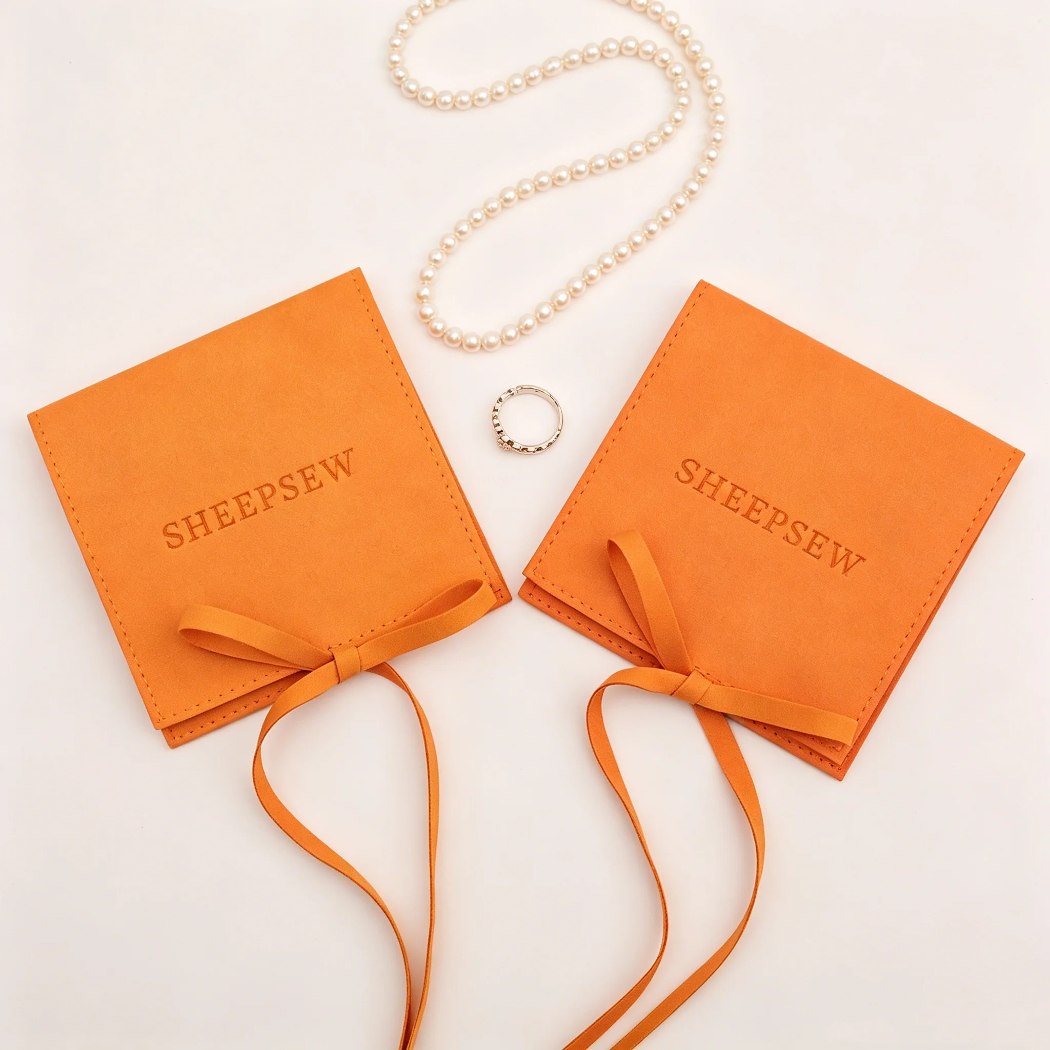 SheepSew 50pcs Ginger Yellow Microfiber Jewelry Pouch Bags Velvet Ring Bracelet Necklace Packaging Pouch With logo
SheepSew 50pcs Ginger Yellow Microfiber Jewelry Pouch Bags Velvet Ring Bracelet Necklace Packaging Pouch With logo