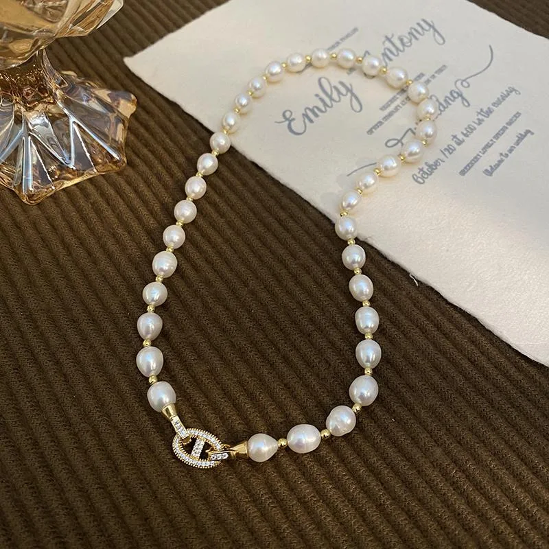 Новое поступление, элегантный блестящий хрустальный замок, натуральный пресноводный жемчуг, 14-каратное золото, женское ожерелье с короткой цепочкой, ювелирные изделия, подарки для вечеринок
Новое поступление, элегантный блестящий хрустальный замок, натуральный пресноводный жемчуг, 14-каратное золото, женское ожерелье с короткой цепочкой, ювелирные изделия, подарки для вечеринок