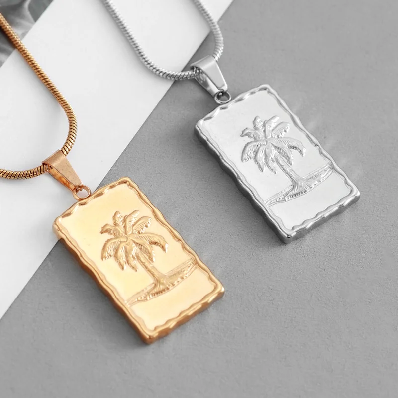 Coconut tree pendant necklace made of stainless steel with snake chain, a neutral style accessory for the beach
Coconut tree pendant necklace made of stainless steel with snake chain, a neutral style accessory for the beach