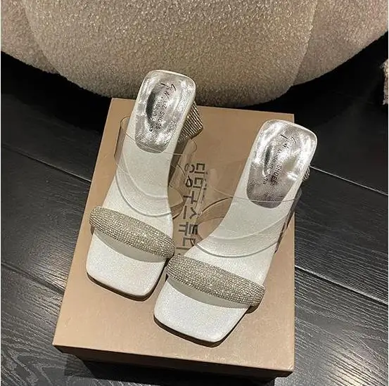 Women's slippers Sandals slippers for women with high heels 2024 summer new rhinestone thick heel open toe thick heel slippers
Women's slippers Sandals slippers for women with high heels 2024 summer new rhinestone thick heel open toe thick heel slippers