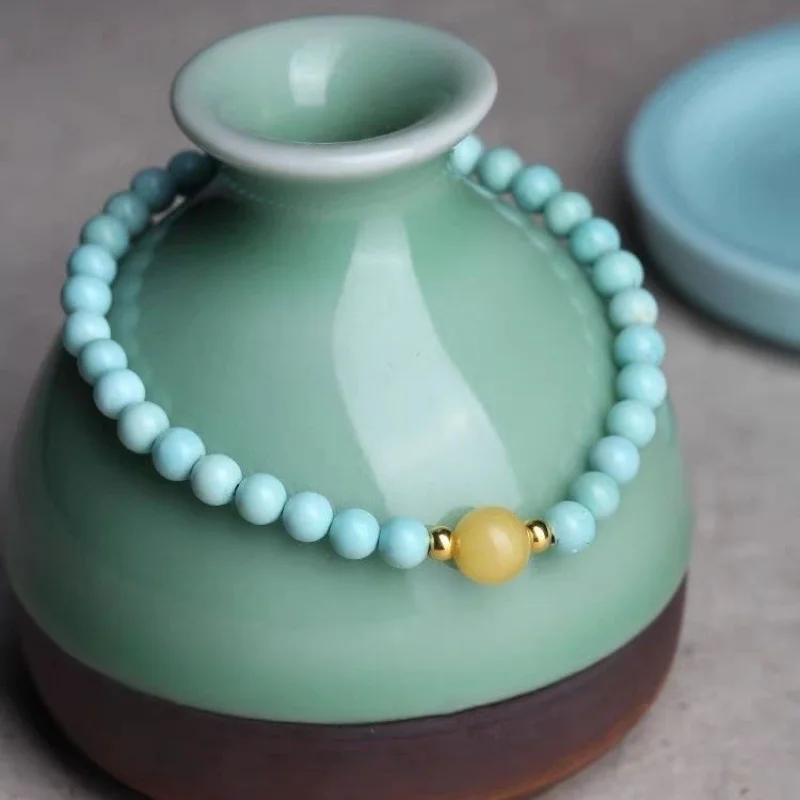Natural Hubei Shiyan Single Circle with Amber Green Turquoise Bead Bracelet
Natural Hubei Shiyan Single Circle with Amber Green Turquoise Bead Bracelet