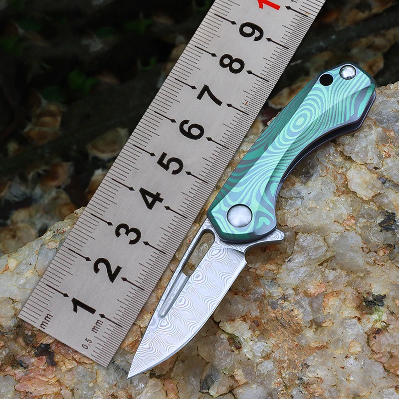 Damascus Steel Surface Pattern Pocket Folding Knife Titanium Hand Outdoor Camping Hunting Necklace Keychain Knife CED Tool
Damascus Steel Surface Pattern Pocket Folding Knife Titanium Hand Outdoor Camping Hunting Necklace Keychain Knife CED Tool