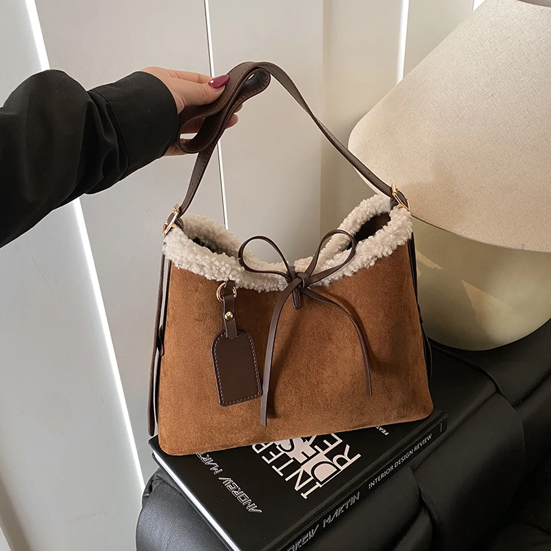 2025 Autumn/winter New Casual Tote Faux Suede Solid Color Bow Fleece Shoulder Bags High Quality Temperament Women's Handbags
2025 Autumn/winter New Casual Tote Faux Suede Solid Color Bow Fleece Shoulder Bags High Quality Temperament Women's Handbags