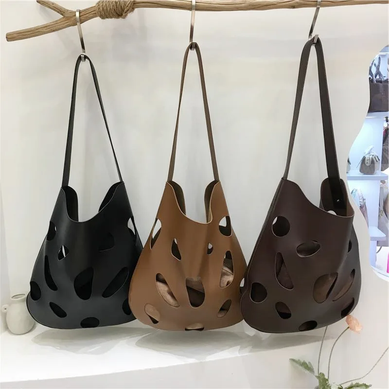 2025 New Product Fashionable Foreign Style Retro Texture Versatile Casual Hollow Bag Women's Shoulder Portable Tote Bag
2025 New Product Fashionable Foreign Style Retro Texture Versatile Casual Hollow Bag Women's Shoulder Portable Tote Bag