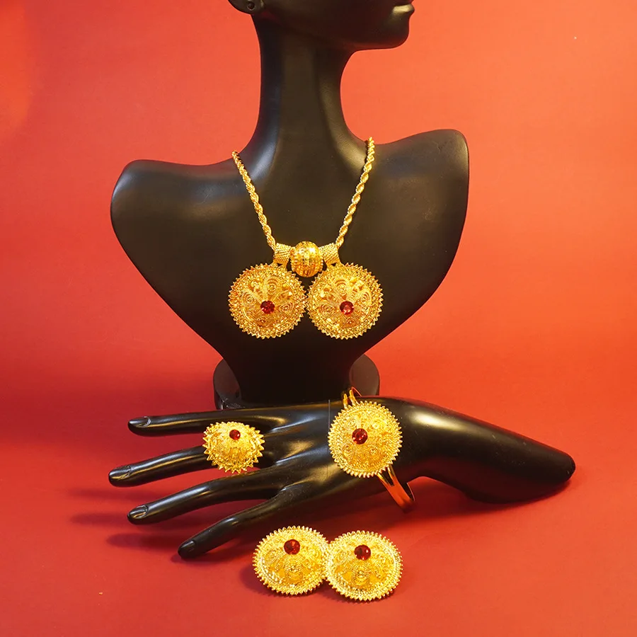 9999 gold fashionable Ethiopian earrings, large pendant ring, bracelet, jewelry set, African bride wedding accessory
9999 gold fashionable Ethiopian earrings, large pendant ring, bracelet, jewelry set, African bride wedding accessory