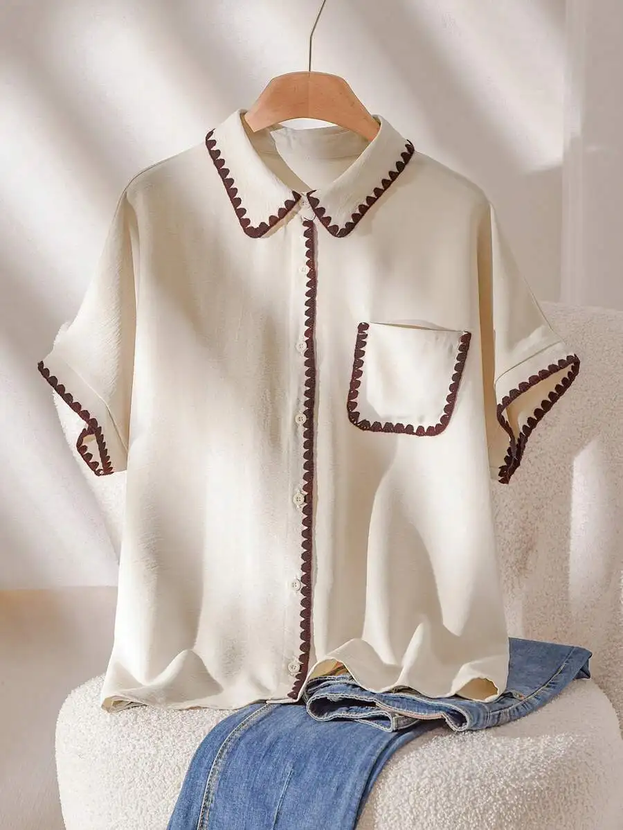 Cream Short Sleeve Button-Up Shirt with Scallop Trim Collar and Pocket
Cream Short Sleeve Button-Up Shirt with Scallop Trim Collar and Pocket