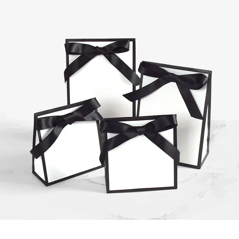 50 шт., картонная бумажная сумка для покупок, подарочная упаковка, портативная черно-белая упаковочная сумка с ручками, сумка для хранения мелочей
50 шт., картонная бумажная сумка для покупок, подарочная упаковка, портативная черно-белая упаковочная сумка с ручками, сумка для хранения мелочей