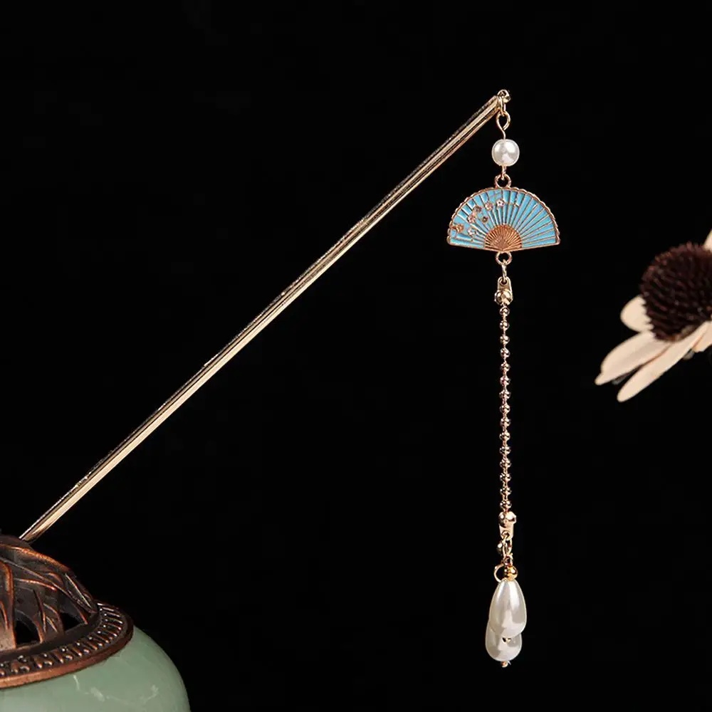 Creative Alloy Bun Hair Headgear Fan Shape Long Tassel Chinese Style Hairpin Women Hair Stick Hair Accessory Cheongsam Headwear
Creative Alloy Bun Hair Headgear Fan Shape Long Tassel Chinese Style Hairpin Women Hair Stick Hair Accessory Cheongsam Headwear