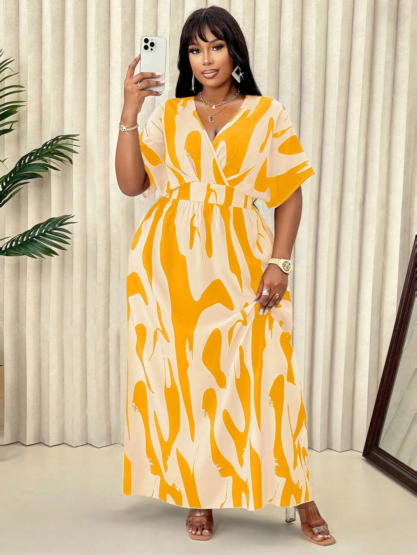 V-Neck Wrap Maxi Dress with Abstract Print and Self-Tie Waist Belt
V-Neck Wrap Maxi Dress with Abstract Print and Self-Tie Waist Belt