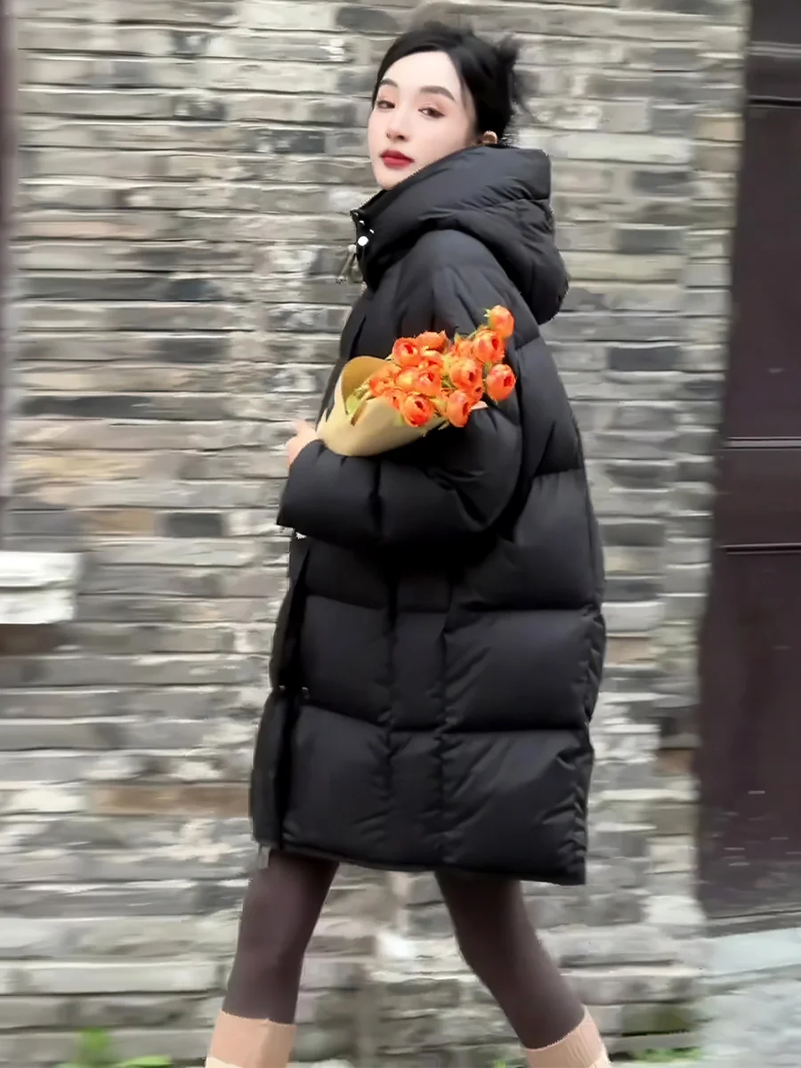 Женская черная удлиненная пуховая куртка с капюшоном, зима 2025, утепленная, с наполнителем из белого утиного пуха, теплая, износостойкая, свободного кроя, повседневная
Женская черная удлиненная пуховая куртка с капюшоном, зима 2025, утепленная, с наполнителем из белого утиного пуха, теплая, износостойкая, свободного кроя, повседневная