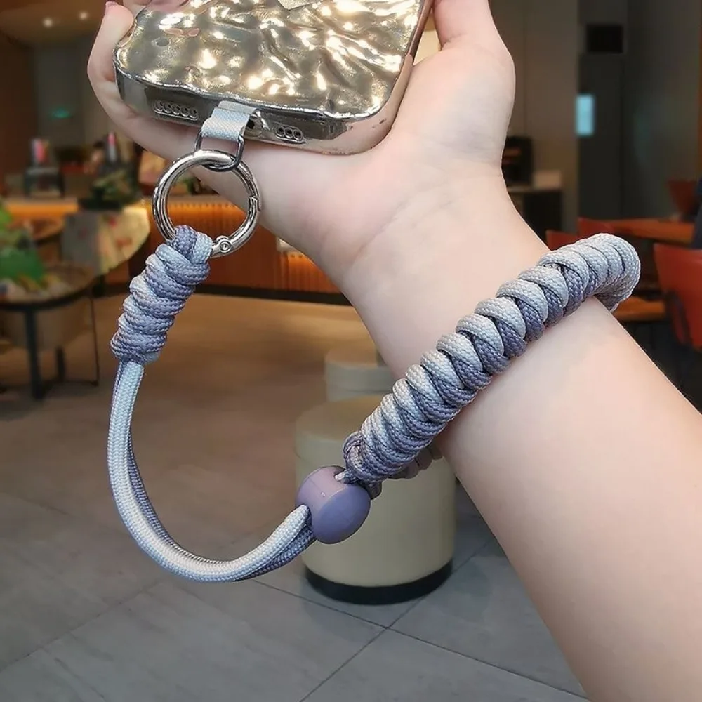 Ремешок для мобильного телефона с коротким плетеным регулируемым запястьем для туризма и альпинизма на открытом воздухе, прочный и с защитой от потерь.
Ремешок для мобильного телефона с коротким плетеным регулируемым запястьем для туризма и альпинизма на открытом воздухе, прочный и с защитой от потерь.