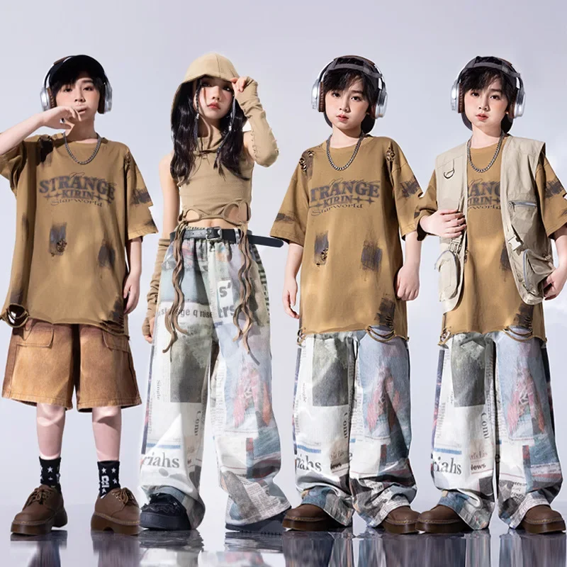 Детская одежда в стиле хип-хоп, свободная футболка для мальчиков, брюки-карго цвета хаки с короткими рукавами, уличные танцевальные костюмы, костюм для джазовых танцев для девочек
Детская одежда в стиле хип-хоп, свободная футболка для мальчиков, брюки-карго цвета хаки с короткими рукавами, уличные танцевальные костюмы, костюм для джазовых танцев для девочек