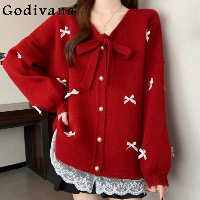 Рождественский искусственный вязаный кардиган из двух предметов с красным бантом, милый женский осенне-зимний универсальный модный свитер средней длины, уменьшающий возраст
Рождественский искусственный вязаный кардиган из двух предметов с красным бантом, милый женский осенне-зимний универсальный модный свитер средней длины, уменьшающий возраст