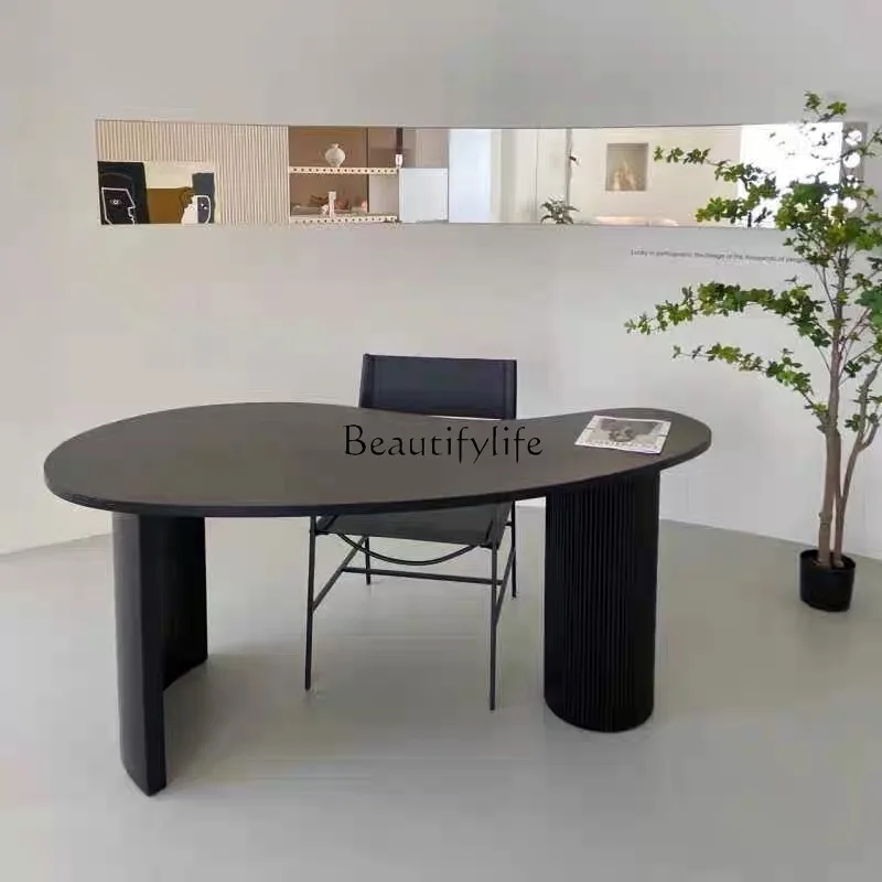 Modern simple special-shaped solid wood desk Nordic light luxury single office computer desk
Modern simple special-shaped solid wood desk Nordic light luxury single office computer desk