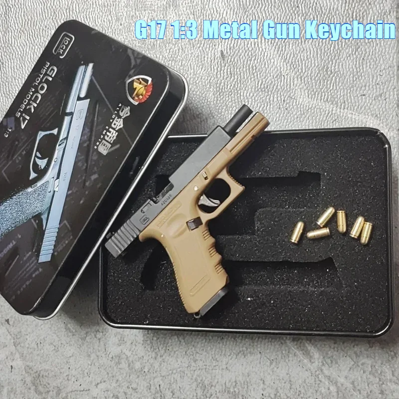 1:3 Pistol Gun Model G17 with Bullets Throw the shell Metal Key chain Ornament PUBG Toy Decoration Crafts Figurines & Miniatures
1:3 Pistol Gun Model G17 with Bullets Throw the shell Metal Key chain Ornament PUBG Toy Decoration Crafts Figurines & Miniatures