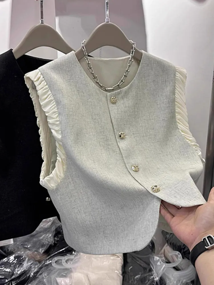 Летний новый шелковый топ-жилет с одним пуговицей, комфортный, визуально стройнящий, с дизайнерским акцентом на детали Musoom Splice, для повседневной носки
Летний новый шелковый топ-жилет с одним пуговицей, комфортный, визуально стройнящий, с дизайнерским акцентом на детали Musoom Splice, для повседневной носки