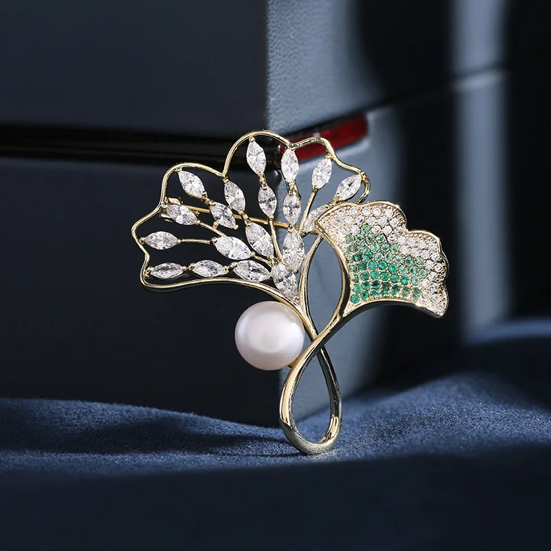 Natural freshwater pearl ginkgo leaf brooch, new leaf brooch design sense, Three Lives with apricot pin
Natural freshwater pearl ginkgo leaf brooch, new leaf brooch design sense, Three Lives with apricot pin