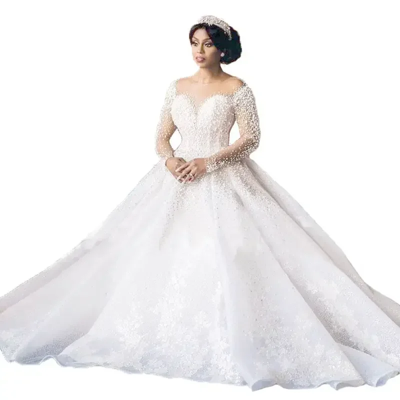 Customized New Style African Women Large Tail Long Sleeve Wedding Dress Pearl Beaded V Neck Elegant Bridal Gown 2023
Customized New Style African Women Large Tail Long Sleeve Wedding Dress Pearl Beaded V Neck Elegant Bridal Gown 2023