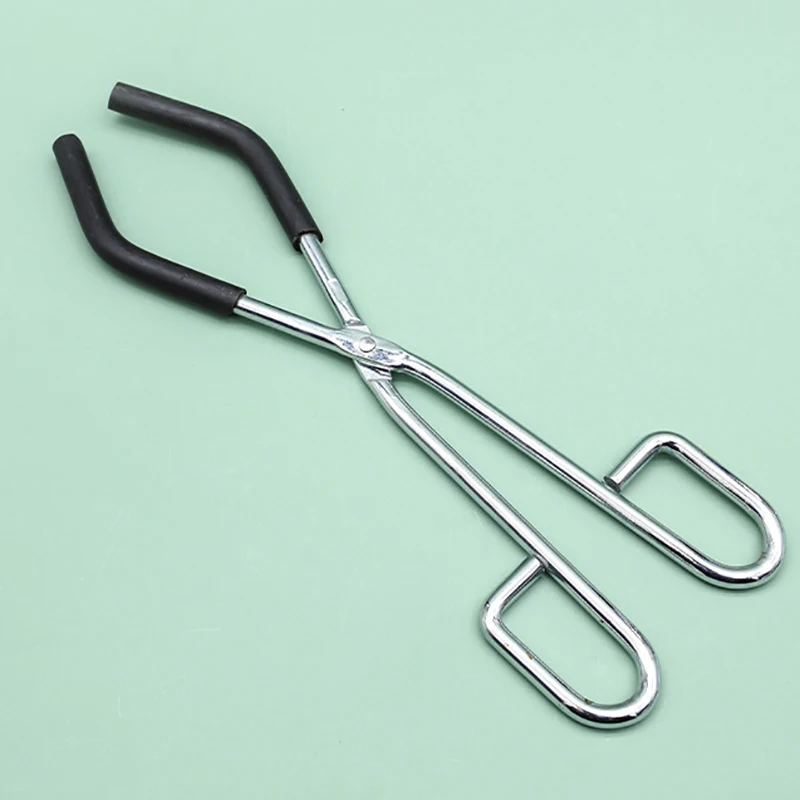 Hand-held beaker holder, about 27cm long, with a maximum opening of 15.3cm and a closed 4cm holder for 50-1000ml beakers
Hand-held beaker holder, about 27cm long, with a maximum opening of 15.3cm and a closed 4cm holder for 50-1000ml beakers