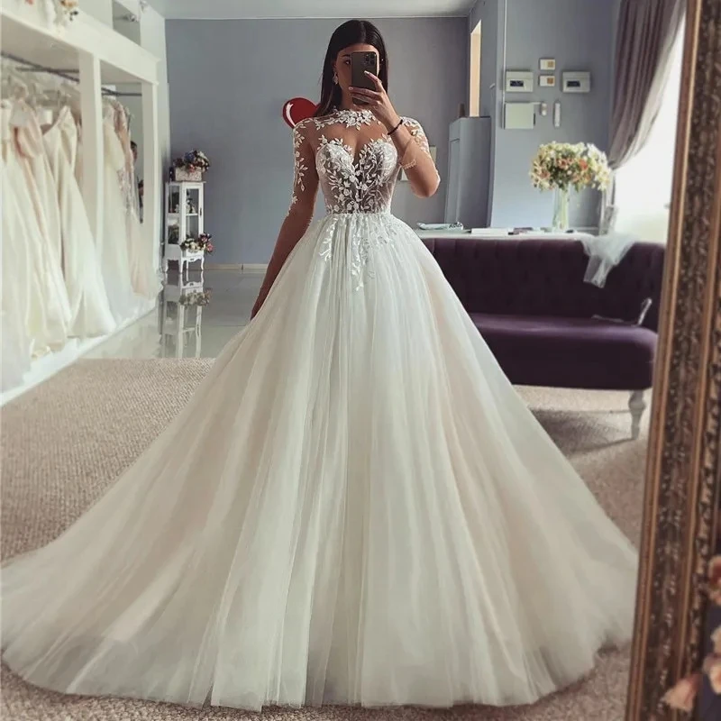 Long Sleeves Boho Wedding Dress A Line Illusion Jewel neck Ivory Tulle Bridal Dress Appliqued Lace Customized 2025 Vestido
Long Sleeves Boho Wedding Dress A Line Illusion Jewel neck Ivory Tulle Bridal Dress Appliqued Lace Customized 2025 Vestido