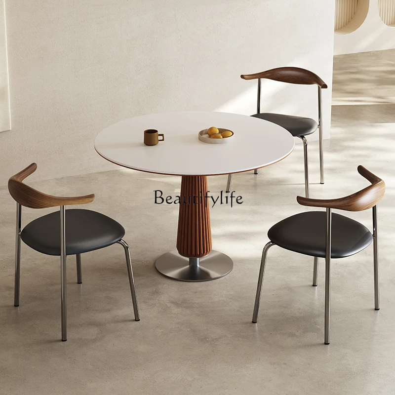 Italian minimalist dining table, living room, small apartment, high-end medieval round dining table
Italian minimalist dining table, living room, small apartment, high-end medieval round dining table