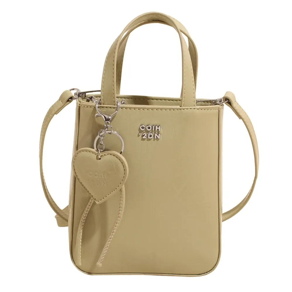 Fashion Pu Leather Shoulder Bag Chic Versatile Small Square Bag with Love Keychain Pendant High Quality Handbags for Women
Fashion Pu Leather Shoulder Bag Chic Versatile Small Square Bag with Love Keychain Pendant High Quality Handbags for Women